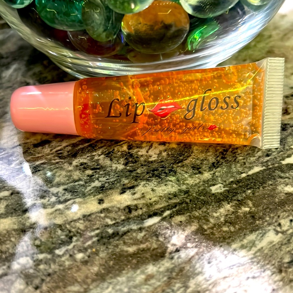 Orange flavor lip gloss